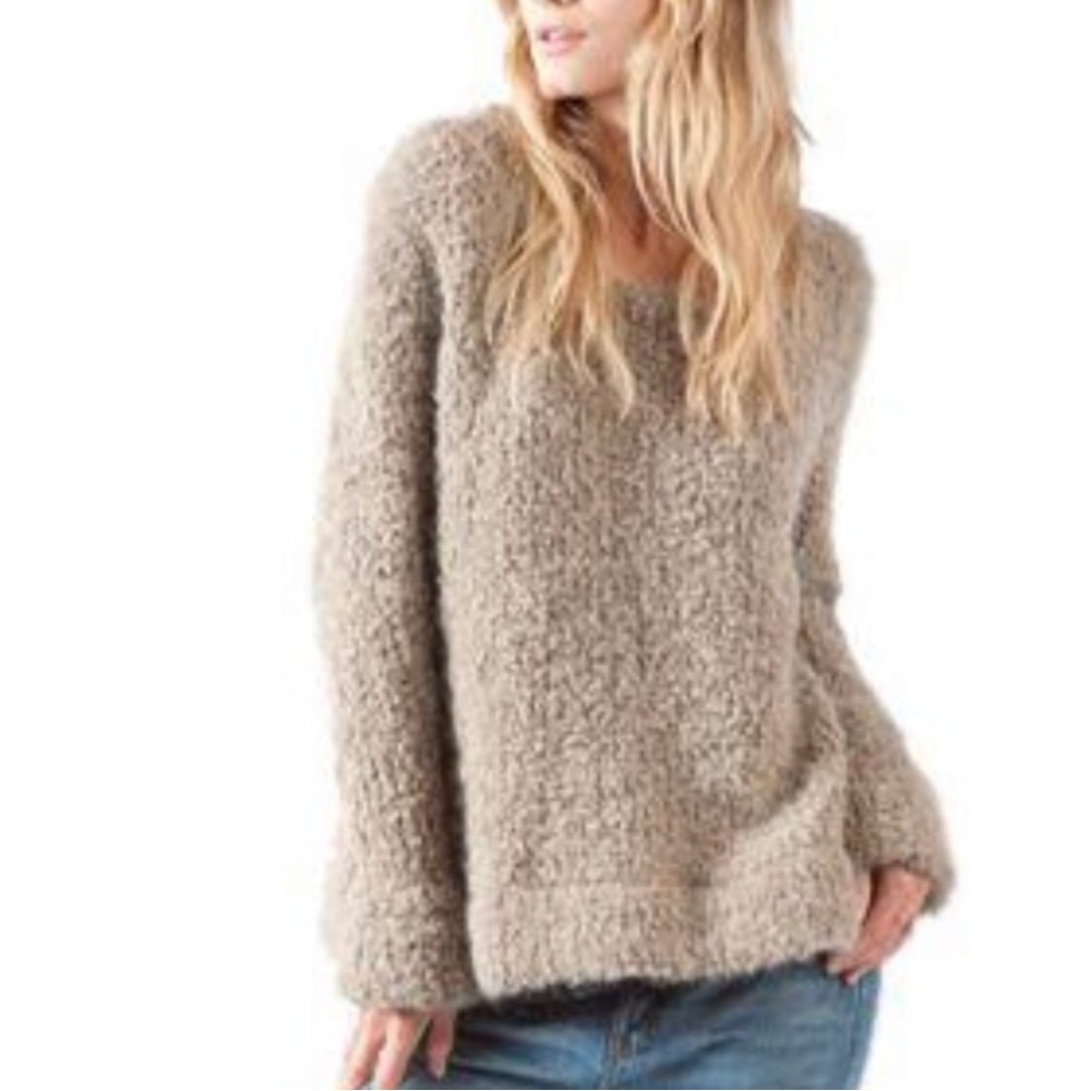 - Merritt Charles tan body chunky sweater.